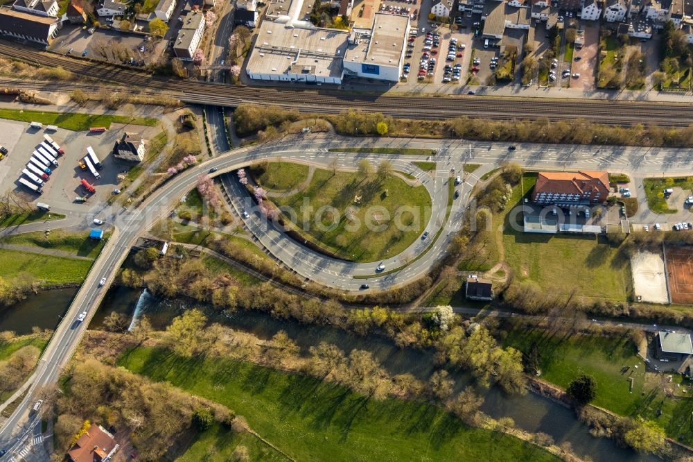 Hüsten from the bird's eye view: City view on the river bank of Ruhr on Arnsberger Strasse in Huesten in the state North Rhine-Westphalia, Germany