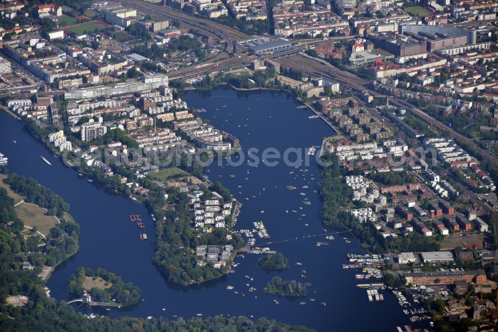 Berlin from the bird's eye view: City view on the river bank of Spree - island Stralau and lake Rummelsburger See in the district Friedrichshain in Berlin, Germany