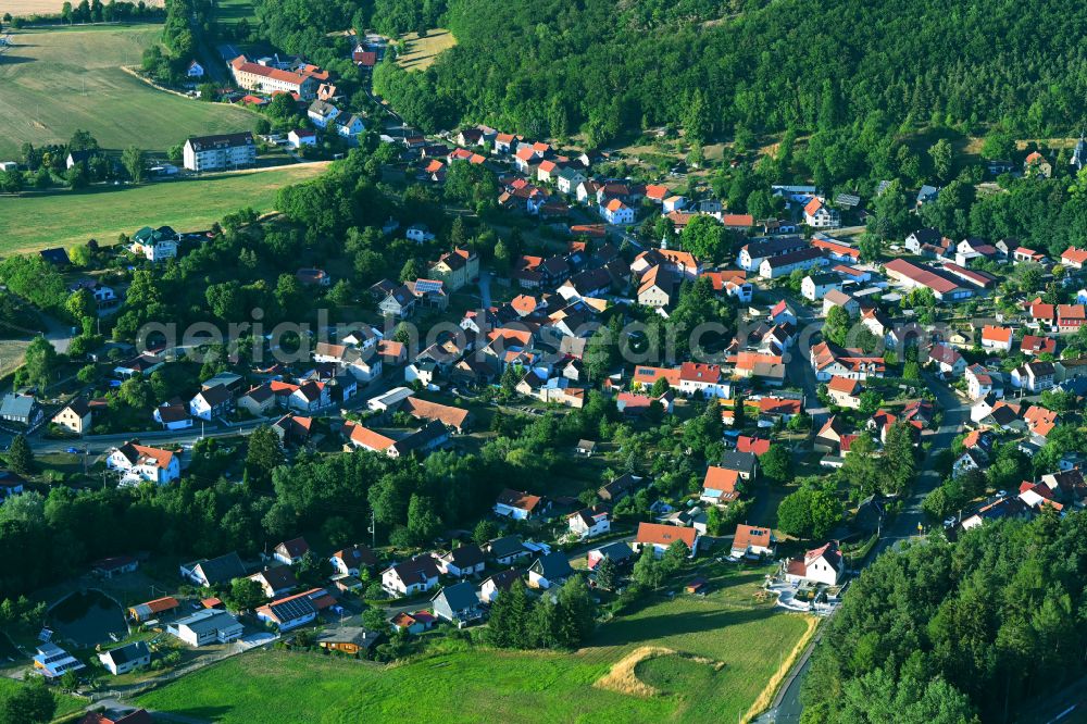 Aerial image Martinroda - City view of the inner city area in the valley surrounded by mountains in Martinroda in the state Thuringia, Germany