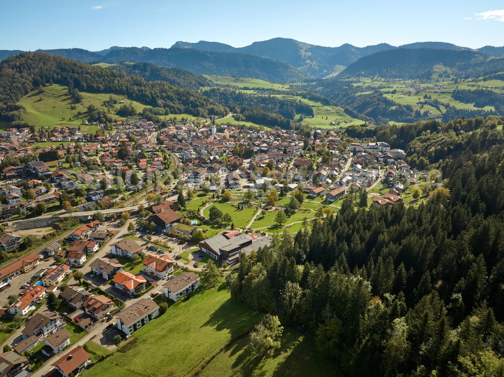 Oberstaufen from the bird's eye view: City view of the inner city area in the valley surrounded by mountains in Oberstaufen Allgaeu in the state Bavaria, Germany