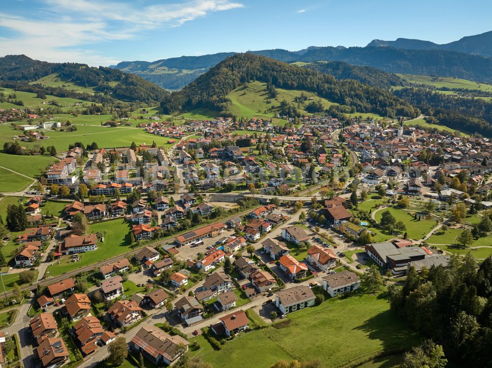 Aerial image Oberstaufen - City view of the inner city area in the valley surrounded by mountains in Oberstaufen Allgaeu in the state Bavaria, Germany