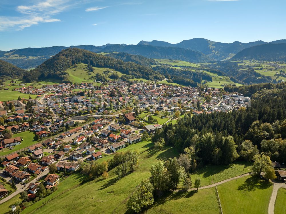 Aerial image Oberstaufen - City view of the inner city area in the valley surrounded by mountains in Oberstaufen Allgaeu in the state Bavaria, Germany