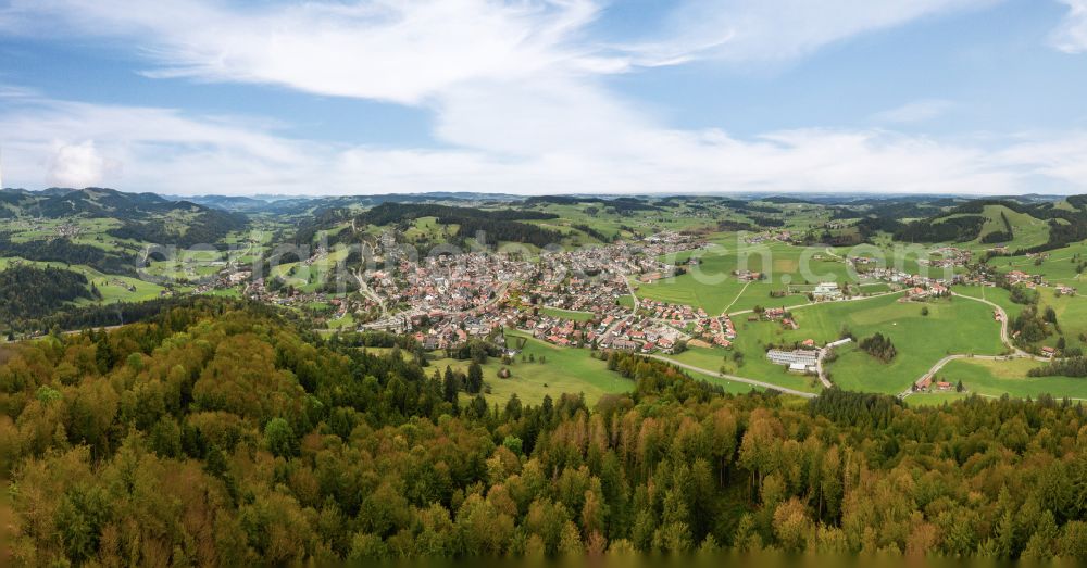 Oberstaufen from the bird's eye view: City view of the inner city area in the valley surrounded by mountains in Oberstaufen Allgaeu in the state Bavaria, Germany