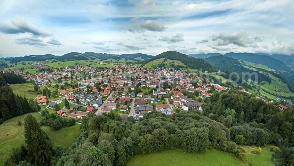 Aerial image Oberstaufen - City view of the inner city area in the valley surrounded by mountains in Oberstaufen Allgaeu in the state Bavaria, Germany