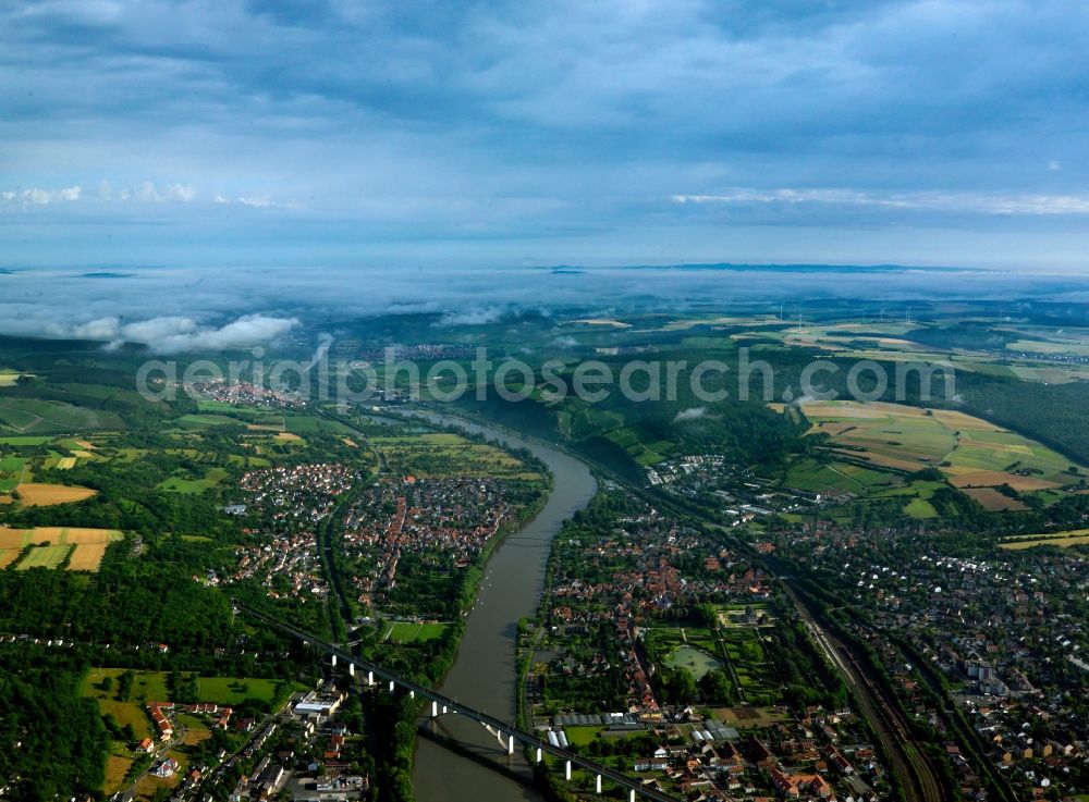 Veitshöchheim from above - Landscape of Veitshoechheim and the Main Valley railway bridge in the state of Bavaria. View from the South to the North. The bridge of the high speed rail-line Hannover-Wuerzburg spans the river in the South of the city. The borough of Margetshoechheim is located on the Western Main riverbank