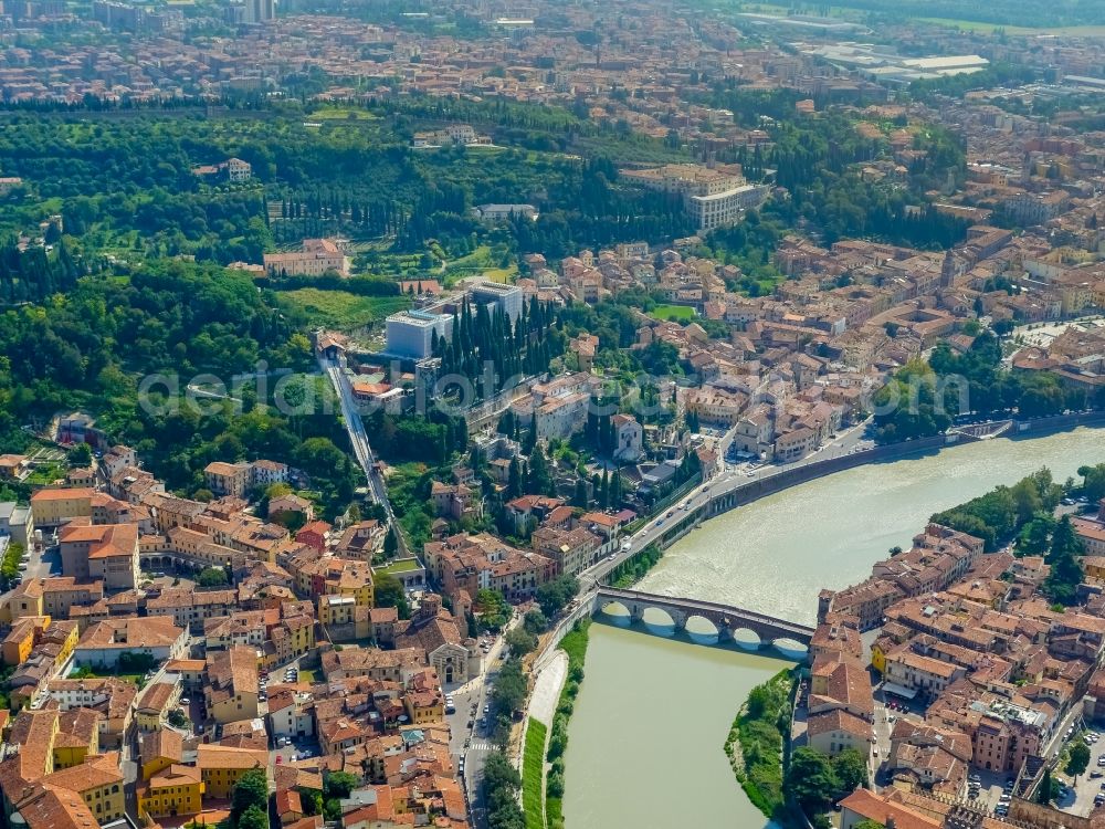 Verona from the bird's eye view: City view of Verona in the region Veneto in Italy. The Adige flows through the city