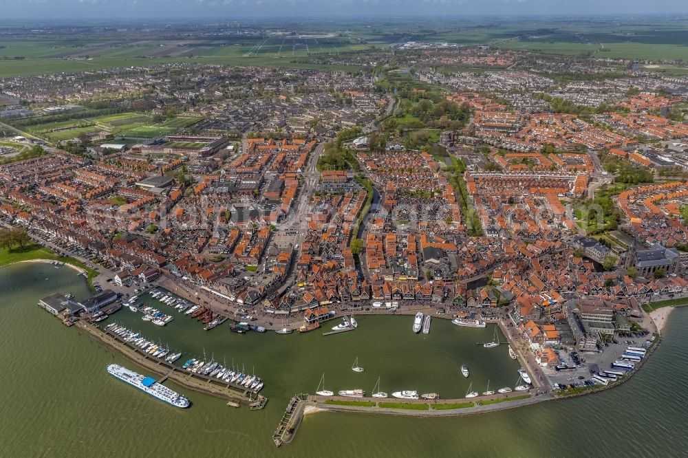 Volendam from the bird's eye view: View of the town of Volendam on the coast to the IJsselmeer in Holland - Netherlands