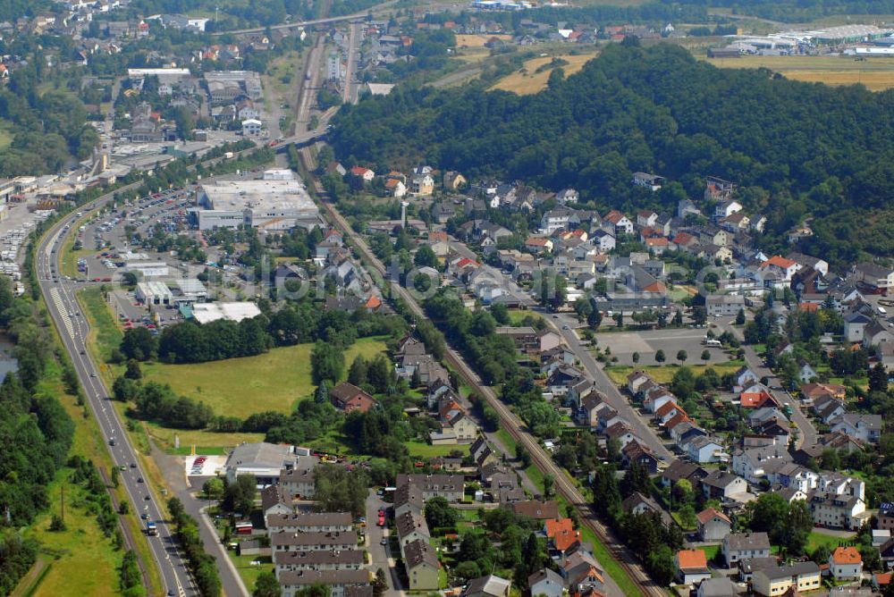 Aerial image Idar-Oberstein / OT Weierbach - Blick auf den Ortsteil Weierbach von Idar-Oberstein. Weierbach bildete sich um 300 n.Chr. aus einer Römersiedlung heraus und ist bekannt für das Julchen, die Braut des berühmten Räuberhauptmannes. Wo einst der Hannes durch den Wald, d. h. der Schinderhannes, gehaust hat, sitzen heute die Spießgesellen. Es sind Weierbacher Vereinsmitglieder beim Spießbratenessen. Die lokale Symbolfigur ist der Spitzbub: Die Weierbacher trugen diesen Beinamen. Seit 1969 ist Weierbach Ortsteil von Idar-Oberstein, mit inzwischen fast 3.000 Einwohnern. Kontakt: Weierbach Stadt Idar-Oberstein, Georg-Maus-Str. 1, 55743 Idar-Oberstein, Tel.: 06781/64-0,