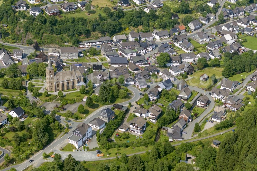 Aerial photograph Winterberg - Cityscape of Winterberg overlooking the church of St. Johannes Baptist in Winterberg in the state of North Rhine-Westphalia