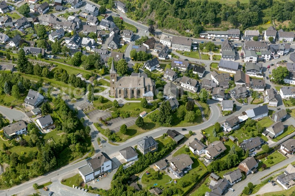 Aerial image Winterberg - Cityscape of Winterberg overlooking the church of St. Johannes Baptist in Winterberg in the state of North Rhine-Westphalia