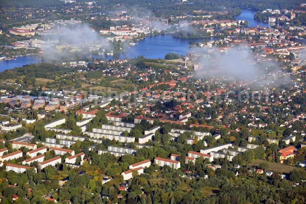 Aerial image Berlin - Cityscape traversed by clouds overlooking the autumnal district of Koepenick along the river Dahme witha view of the Rohrwall-Island in Berlin. Residential areas and green space along Wendenschlossstrasse