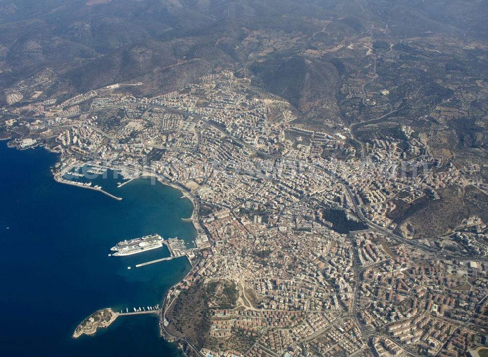 Kusadasi from the bird's eye view: City view from the center of Kusadasi a district town on Turkey's Aegean coast in the province of Ayd?n. Kusadasi is now a popular destination for local and foreign tourists. It has next to a large marina and a port for cargo and cruise ships