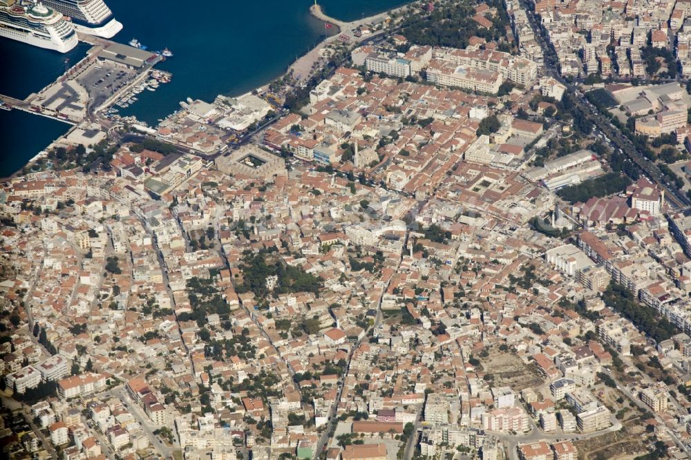 Aerial image Kusadasi - City view from the center of Kusadasi a district town on Turkey's Aegean coast in the province of Ayd?n. Kusadasi is now a popular destination for local and foreign tourists. It has next to a large marina and a port for cargo and cruise ships