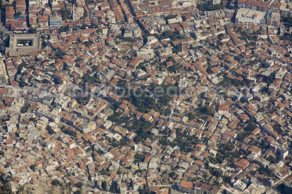 Kusadasi from above - City view from the center of Kusadasi a district town on Turkey's Aegean coast in the province of Ayd?n. Kusadasi is now a popular destination for local and foreign tourists. It has next to a large marina and a port for cargo and cruise ships