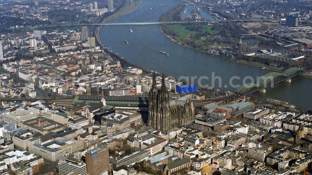 Köln from the bird's eye view: View of the Cologne Cathedral in the center of Cologne, near central station. The Cologne Cathedral is a Roman Catholic church in the Gothic style in Cologne and the Cathedral of the Archdiocese of Cologne. It is the second highest church building in Europe and the third highest in the world