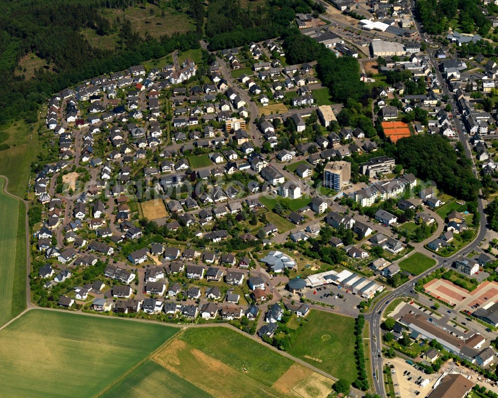 Emmelshausen from above - View of the town centre of Emmelshausen in the state of Rhineland-Palatinate. The town is an official spa resort in the county district of Rhine-Hunsrueck, surrounded by fields, meadows and forest. The East of the town centre includes residential areas