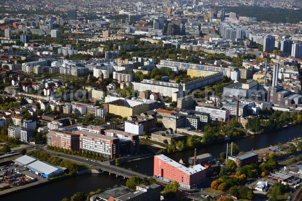 Berlin from above - Quarter view of the district Friedrichshain-Kreuzberg in Berlin. To see in the foreground are the german headquarter of Verdi and the Ibishotel Ostbahnhof at the Schilling Bridge