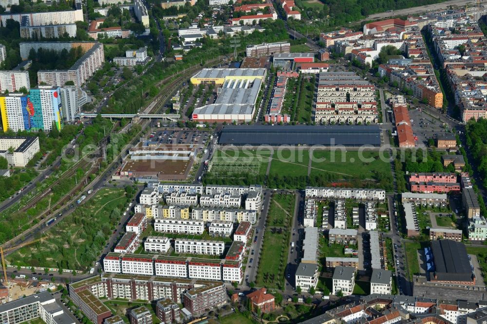 Aerial image Berlin - Urban development area on the premises of Eldenaer road - Storkower Strasse in Friedrichshain district of Berlin. On the grounds of the former East German slaughterhouse incur modern residential areas and neighborhoods. The housing companies in the real estate developers cds Wohnbau Berlin GmbH built on several building plots modern apartments and townhouses and terraced houses