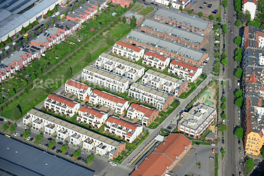 Aerial image Berlin - Urban development area on the premises of Eldenaer road - Storkower Strasse in Friedrichshain district of Berlin. On the grounds of the former East German slaughterhouse incur modern residential areas and neighborhoods. The housing companies in the real estate developers cds Wohnbau Berlin GmbH built on several building plots modern apartments and townhouses and terraced houses