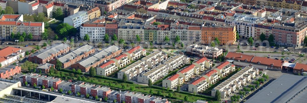 Aerial image Berlin - Urban development area on the premises of Eldenaer road - Storkower Strasse in Friedrichshain district of Berlin. On the grounds of the former East German slaughterhouse incur modern residential areas and neighborhoods. The housing companies in the real estate developers cds Wohnbau Berlin GmbH built on several building plots modern apartments and townhouses and terraced houses