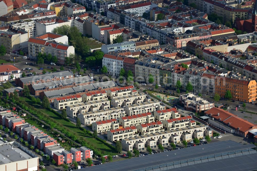 Berlin from above - Urban development area on the premises of Eldenaer road - Storkower Strasse in Friedrichshain district of Berlin. On the grounds of the former East German slaughterhouse incur modern residential areas and neighborhoods. The housing companies in the real estate developers cds Wohnbau Berlin GmbH built on several building plots modern apartments and townhouses and terraced houses