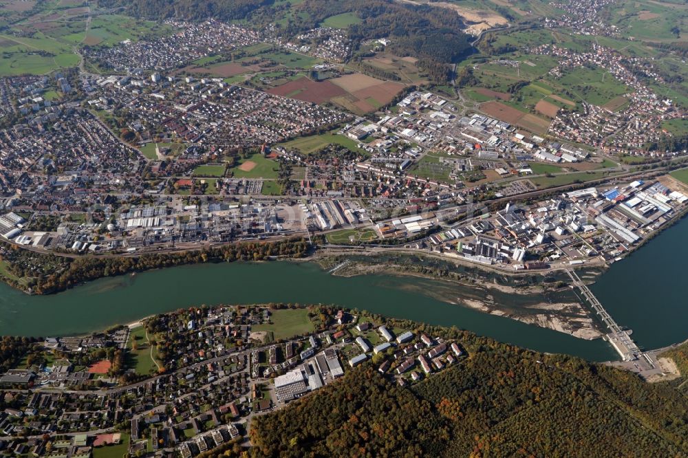 Aerial photograph Rheinfelden (Baden) - City area with outside districts, industrial areas with Evonik, Rheinfelden Alloys and hydro power plant of Energiedienst at the river Rhine in Rheinfelden (Baden) in the state Baden-Wurttemberg, Germany