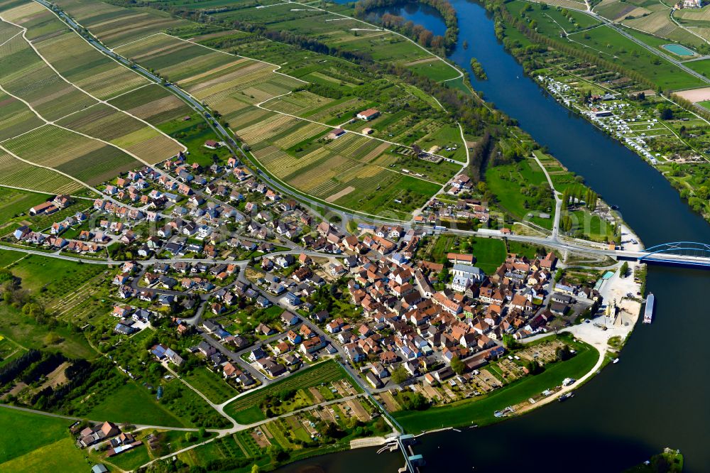 Astheim from the bird's eye view: Urban area with outskirts and inner city area on the edge of agricultural fields and arable land in Astheim in the state Bavaria, Germany