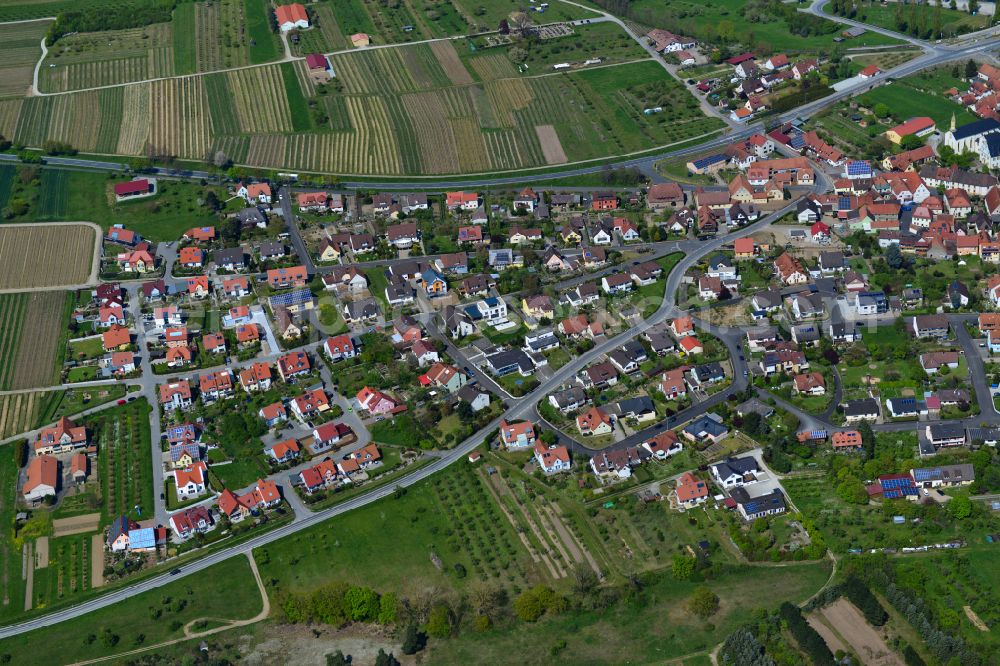 Aerial image Astheim - Urban area with outskirts and inner city area on the edge of agricultural fields and arable land in Astheim in the state Bavaria, Germany