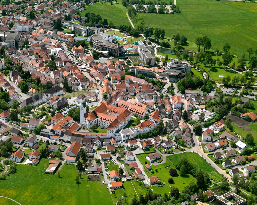 Bad Buchau from the bird's eye view: Urban area with outskirts and inner city area on the edge of agricultural fields and arable land in Bad Buchau in the state Baden-Wuerttemberg, Germany