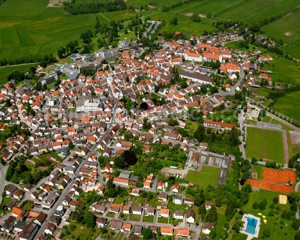 Aerial image Bad Buchau - Urban area with outskirts and inner city area on the edge of agricultural fields and arable land in Bad Buchau in the state Baden-Wuerttemberg, Germany