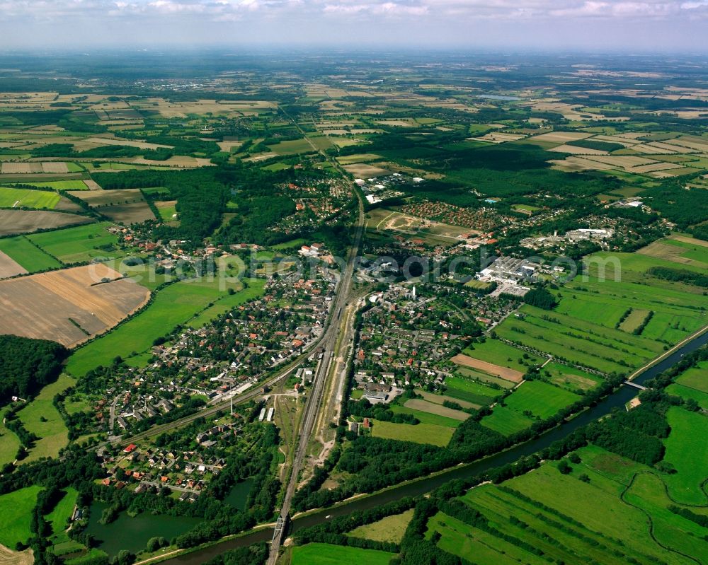 Büchen from the bird's eye view: Urban area with outskirts and inner city area on the edge of agricultural fields and arable land in Büchen in the state Schleswig-Holstein, Germany