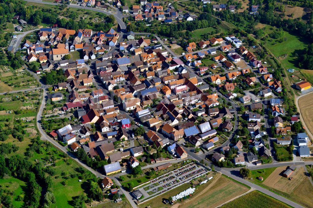 Bieberehren from the bird's eye view: Urban area with outskirts and inner city area on the edge of agricultural fields and arable land in Bieberehren in the state Bavaria, Germany