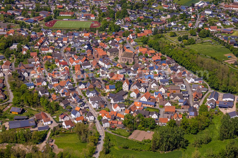 Borgentreich from the bird's eye view: Urban area with outskirts and inner city area on the edge of agricultural fields and arable land in Borgentreich in the state North Rhine-Westphalia, Germany