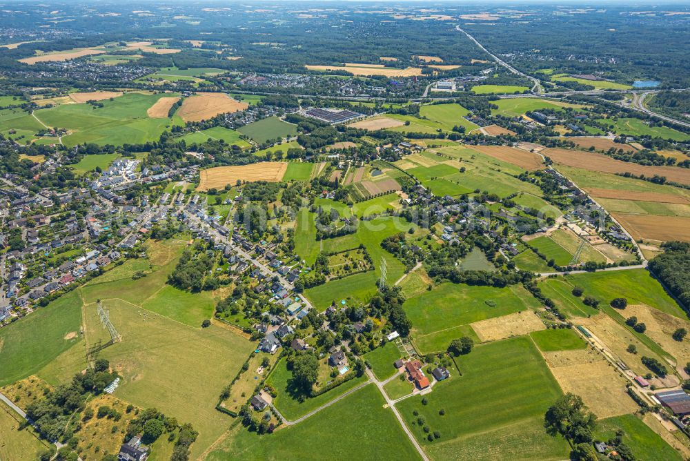 Aerial image Breitscheid - Urban area with outskirts and inner city area on the edge of agricultural fields and arable land in Breitscheid in the state North Rhine-Westphalia, Germany