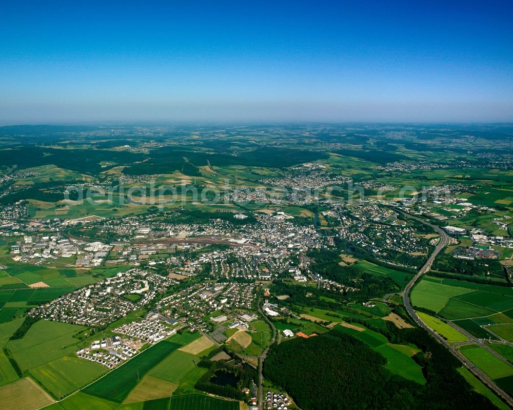 Aerial image Dietkirchen - Urban area with outskirts and inner city area on the edge of agricultural fields and arable land in Dietkirchen in the state Hesse, Germany