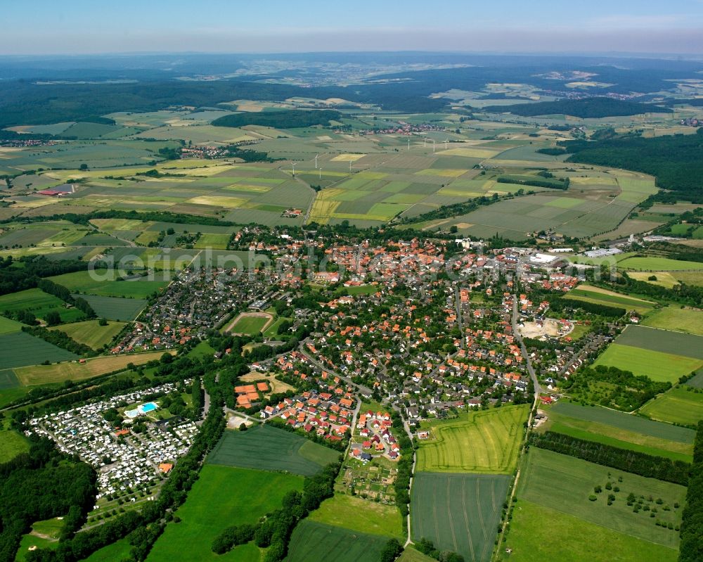 Dransfeld from above - Urban area with outskirts and inner city area on the edge of agricultural fields and arable land in Dransfeld in the state Lower Saxony, Germany