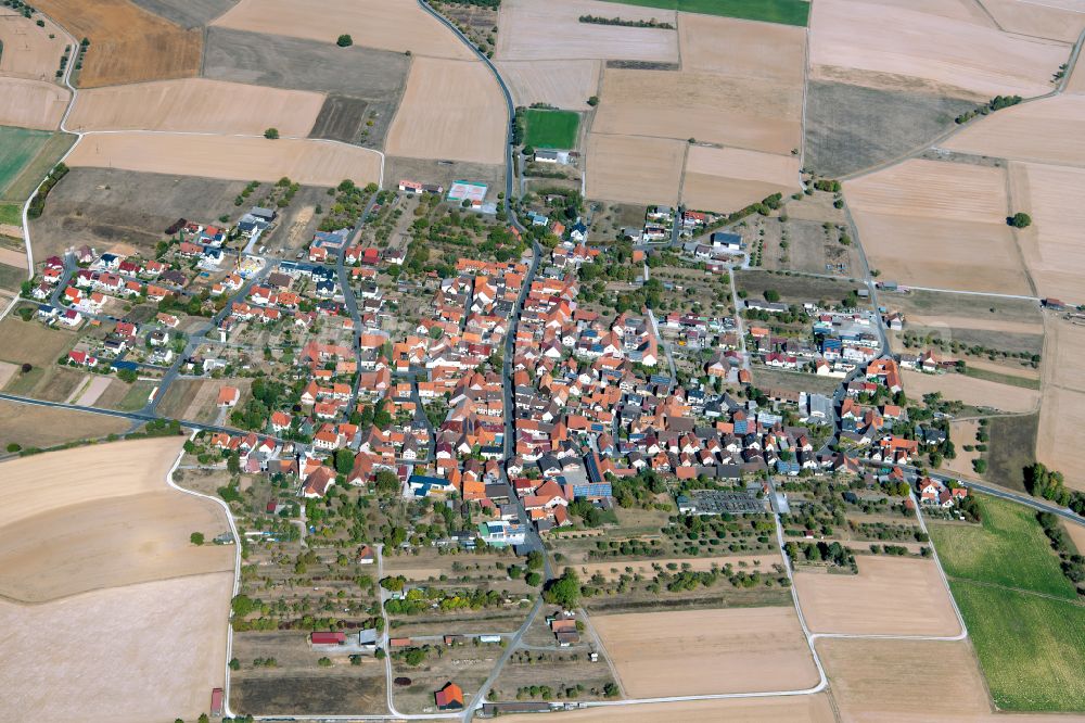 Aerial photograph Duttenbrunn - Urban area with outskirts and inner city area on the edge of agricultural fields and arable land in Duttenbrunn in the state Bavaria, Germany