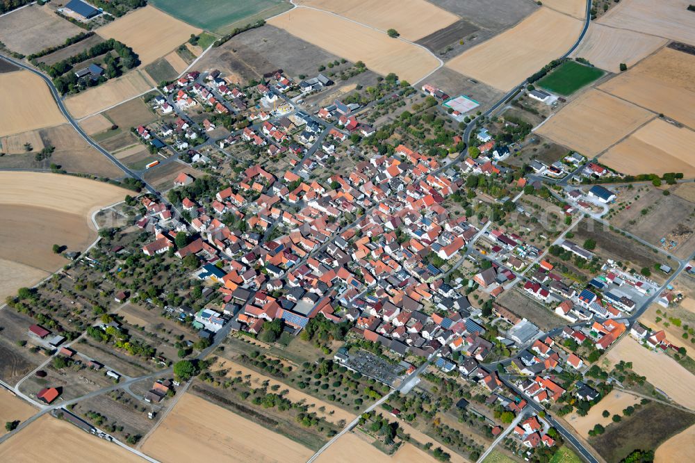 Duttenbrunn from above - Urban area with outskirts and inner city area on the edge of agricultural fields and arable land in Duttenbrunn in the state Bavaria, Germany