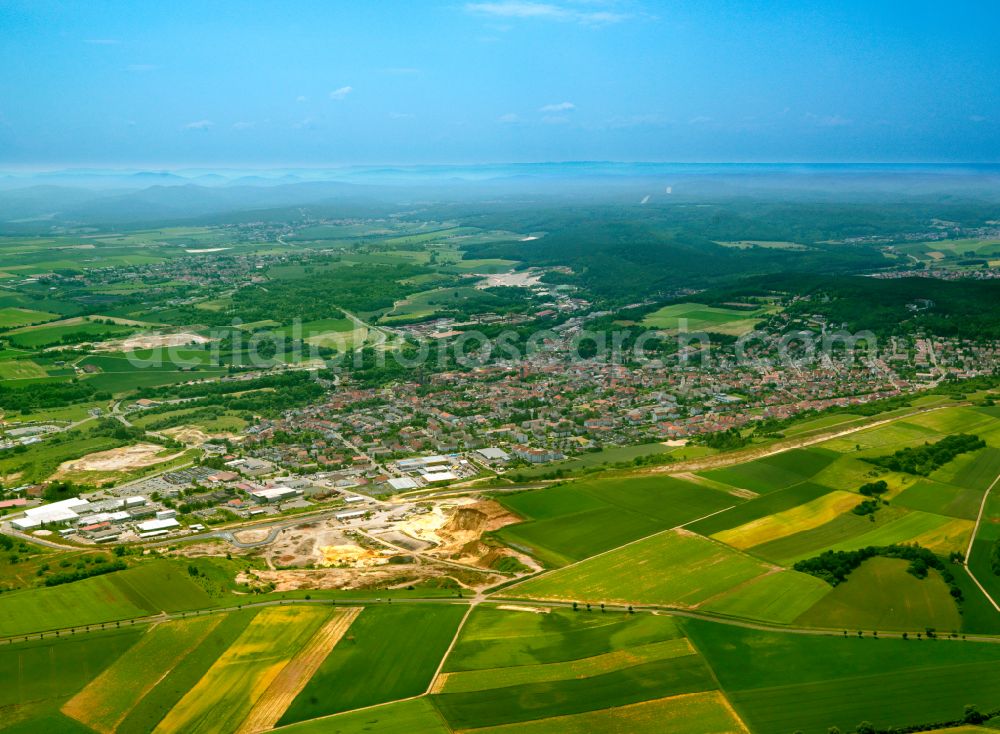 Eisenberg (Pfalz) from the bird's eye view: Urban area with outskirts and inner city area on the edge of agricultural fields and arable land in Eisenberg (Pfalz) in the state Rhineland-Palatinate, Germany