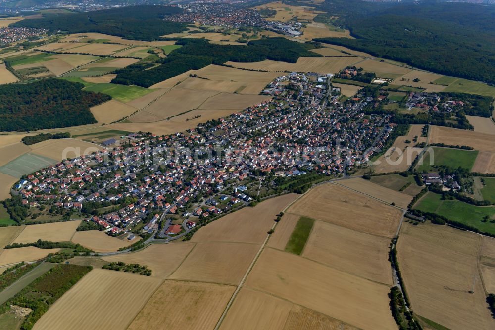 Aerial image Eisingen - Urban area with outskirts and inner city area on the edge of agricultural fields and arable land in Eisingen in the state Bavaria, Germany