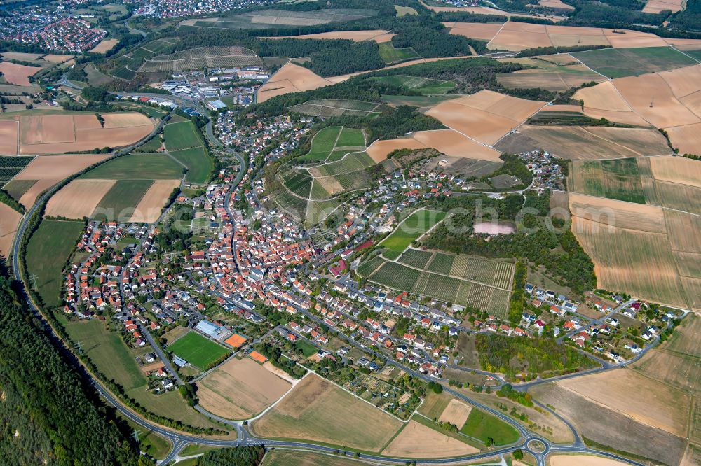 Erlenbach bei Marktheidenfeld from above - Urban area with outskirts and inner city area on the edge of agricultural fields and arable land in Erlenbach bei Marktheidenfeld in the state Bavaria, Germany