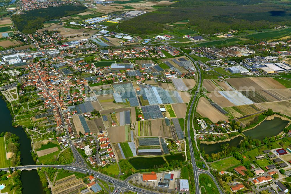 Aerial image Etwashausen - Urban area with outskirts and inner city area on the edge of agricultural fields and arable land in Etwashausen in the state Bavaria, Germany