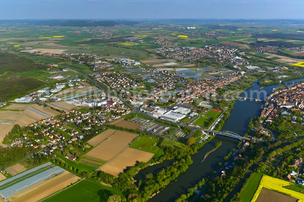 Aerial image Etwashausen - Urban area with outskirts and inner city area on the edge of agricultural fields and arable land in Etwashausen in the state Bavaria, Germany