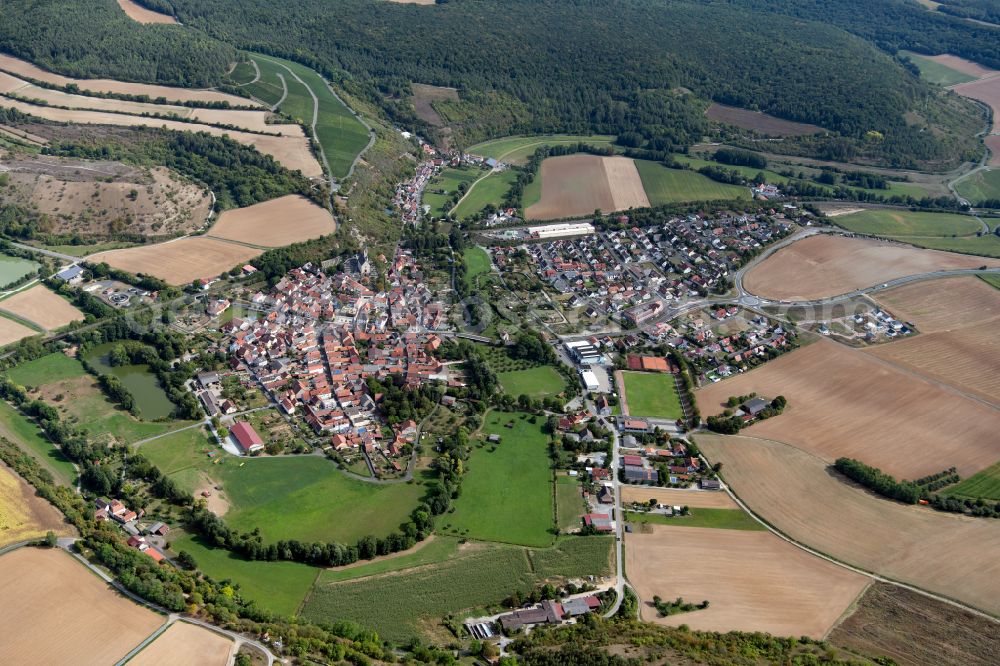 Aerial photograph Eußenheim - Urban area with outskirts and inner city area on the edge of agricultural fields and arable land in Eußenheim in the state Bavaria, Germany