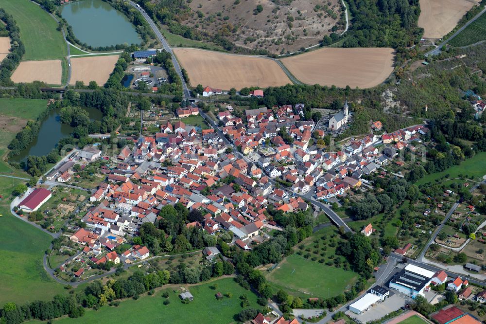 Eußenheim from above - Urban area with outskirts and inner city area on the edge of agricultural fields and arable land in Eußenheim in the state Bavaria, Germany