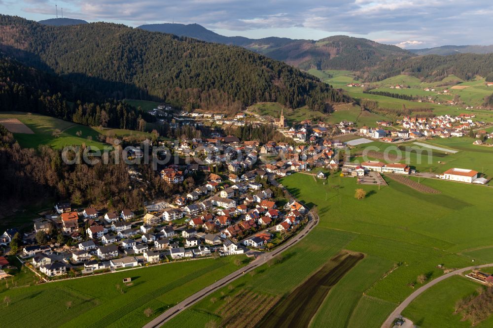 Aerial photograph Fischerbach - Urban area with outskirts and inner city area on the edge of agricultural fields and arable land in Fischerbach in the state Baden-Wuerttemberg, Germany