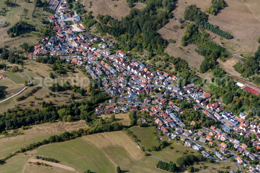 Aerial photograph Frammersbach - Urban area with outskirts and inner city area on the edge of agricultural fields and arable land in Frammersbach in the state Bavaria, Germany