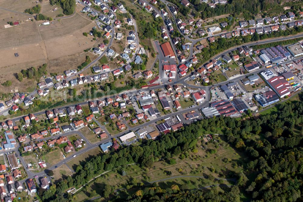 Frammersbach from the bird's eye view: Urban area with outskirts and inner city area on the edge of agricultural fields and arable land in Frammersbach in the state Bavaria, Germany