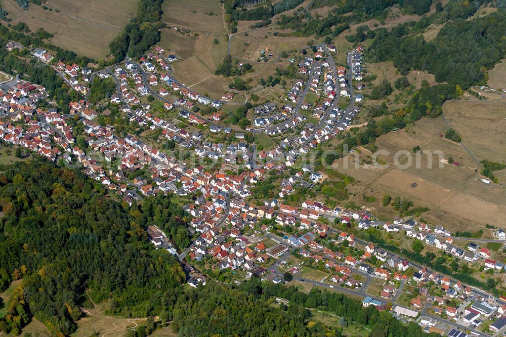 Aerial image Frammersbach - Urban area with outskirts and inner city area on the edge of agricultural fields and arable land in Frammersbach in the state Bavaria, Germany