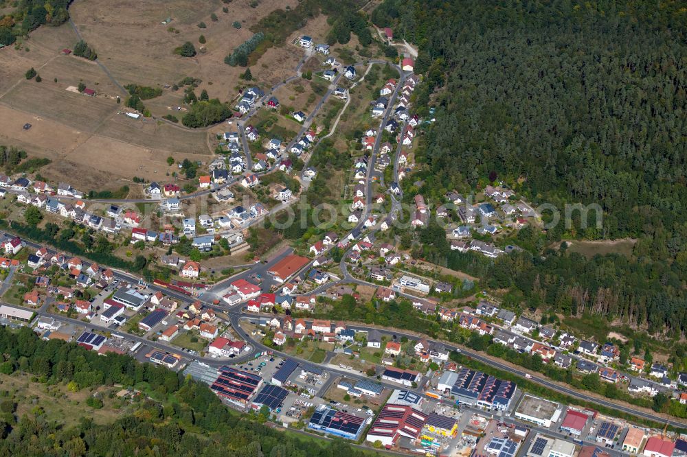 Frammersbach from above - Urban area with outskirts and inner city area on the edge of agricultural fields and arable land in Frammersbach in the state Bavaria, Germany